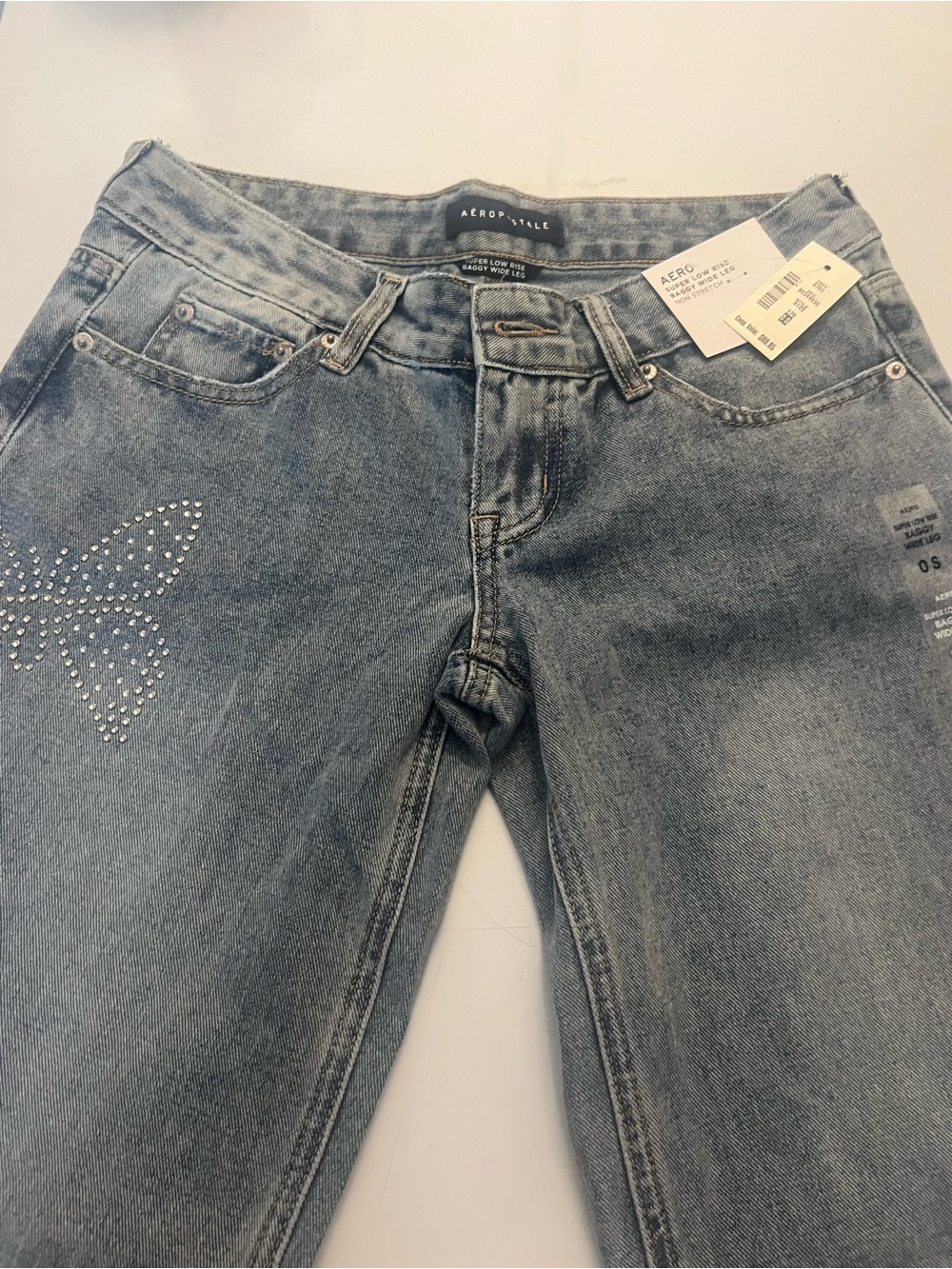 Aeropostale Light Blue super low rise Women’s Jeans with Rhinestone Butterfly